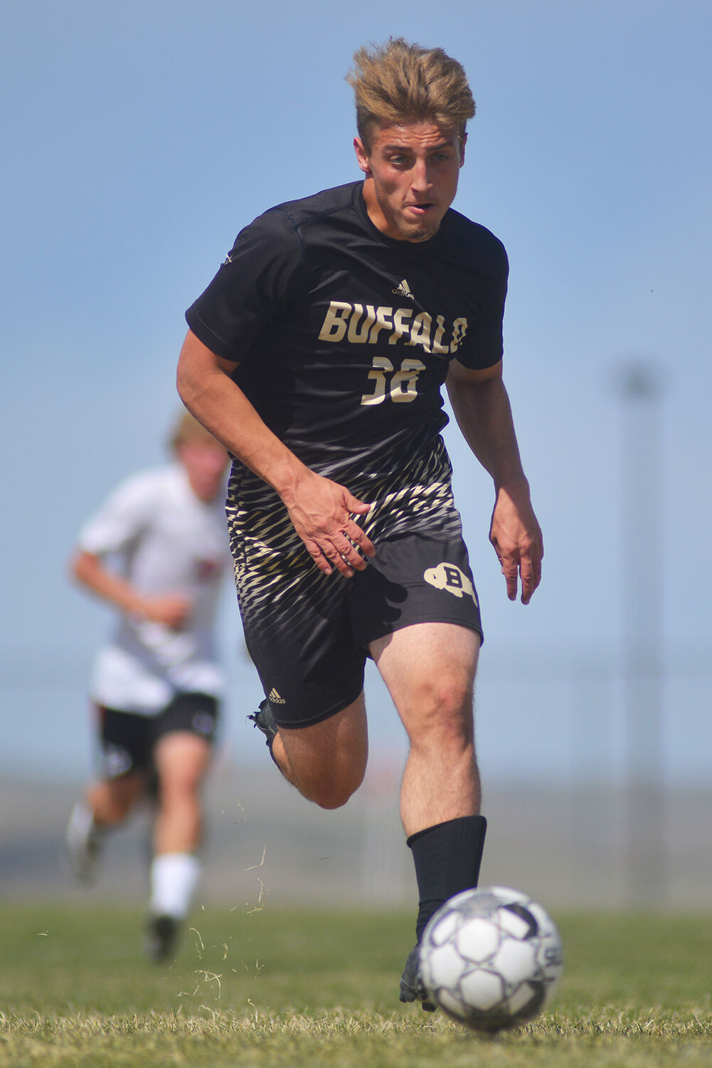 Aidan O’Neill drives the ball downfield during the second half